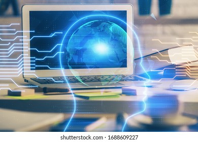 Double exposure of work space with computer and human brain drawing hologram. Brainstorm concept.