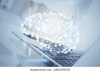 Double exposure of work space with computer and human brain drawing hologram. Brainstorm concept.