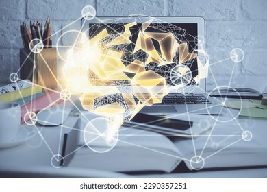 Double exposure of work space with computer and human brain drawing hologram. Brainstorm concept.