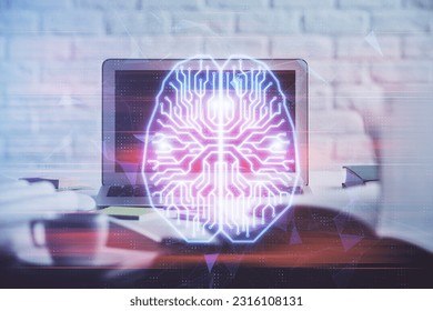 Double exposure of work space with computer and human brain drawing hologram. Brainstorm concept.