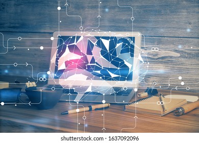 Double exposure of work table with computer and brain sketch hologram. Brainstorming concept.