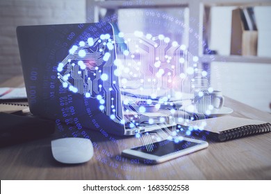 Double exposure of work table with computer and brain sketch hologram. Brainstorming concept.
