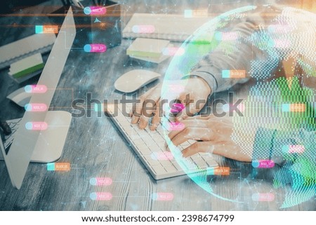 Double exposure of world map hologram with man working on computer on background. Concept of worldwideweb.