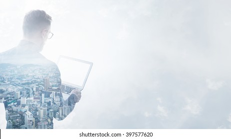 Double exposure young bearded businessman wearing black shirt holding contemporary notebook hands.Isolated white,modern city background.Blank screen ready for your business message.Wide mockup  - Shutterstock ID 397577620