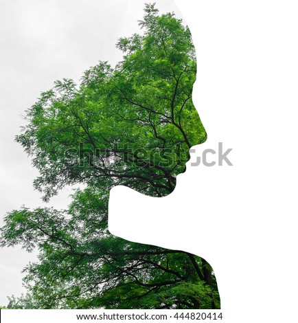 Double exposure of young beautiful girl among the leaves and trees. Black and white silhouette Isolated on white background.