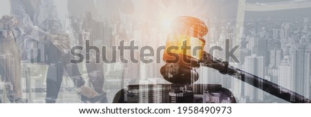 Double exposure-business people team discussion,in public sale property bidding business competition concept,with auction wood hammer,with cityscape sunset background,web banner header  