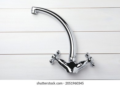 Double Handle Water Tap On White Wooden Table, Top View