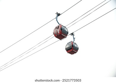 Double line cable car attraction for tourists at Pantai Indah Ancol, North Jakarta.