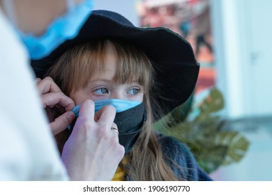 Double Mask. The Girl Is Wearing A Second Mask In The Mall