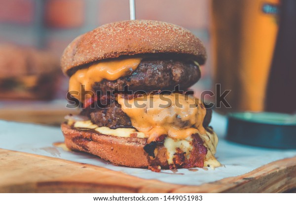 Double Meat Burger. delicious gourmet burger  with\
cheese and bacon