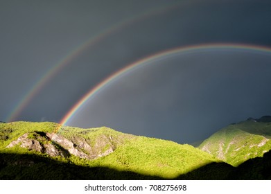 double rainbow in the mountain