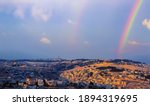 Double rainbow over Mount of Olives, with panoramic view from the Old city with Dome of the Rock on Temple Mount, Mount Scopus, the churches of Ascension to the arab villages in the Kidron valley