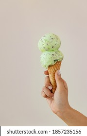 Double Scoop Of Mint Chocolate Chip Ice Cream On A Cone