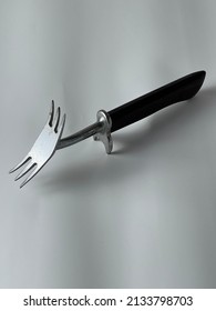 Double Sided Carving Fork Isolated On White Background.