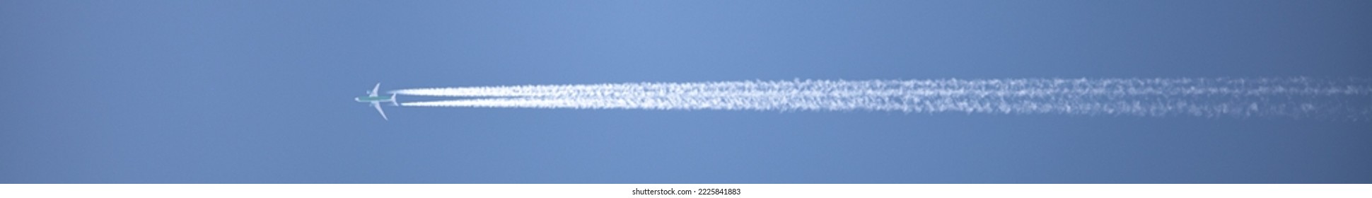 double track in the sky from a jet plane	