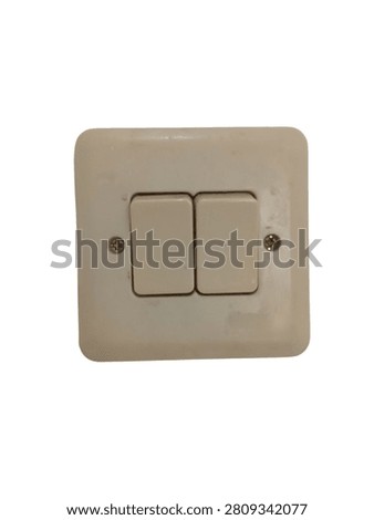 Double wall light switch isolated on white background. Close up of two gang electrical switch for residential interior, electricity control, renovation, home installation, and maintenance concepts.