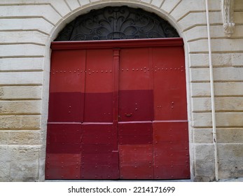 Double Wooden Ancient Door Old Building Entrance Closed With Arch On Street City 