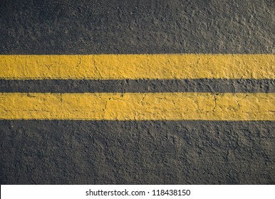 Double Solid Yellow Lines On Asphalt Stock Illustration 124415167