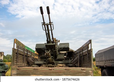 Double-barreled anti-aircraft gun in the back of the car