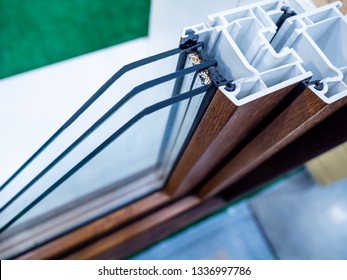 Double-glazed window for plastic windows in the section. Profile of metal-plastic windows. PVC profile for windows. Three-chamber window profile. Installing double-glazed windows.