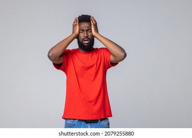 Doubt, Need To Think. Bearded Man With Dreadlocks Hands On Head While Thinking With Confused Puzzled Face On Gray Background.