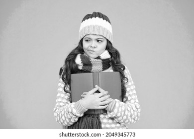 Doubtful Ending Of Book. Leisure In Winter Time. Childhood Development. Interesting Information. Library Concept. Reading Skills. Winter Story. Girl Reading Book. Kid Enjoying Book. Little Book Lover