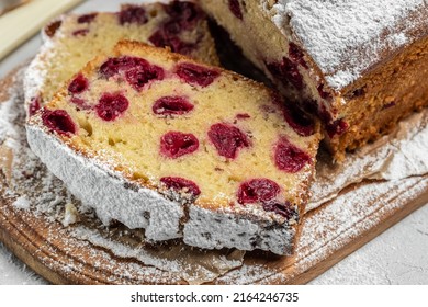 dough cake with berries for dessert, cupcake sweet bread with cherries, Homemade sponge cake or chiffon cake on white table. Homemade bakery concept, top view,