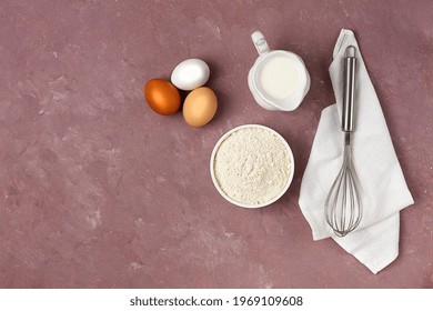  Dough Ingredients, Milk, Eggs, Flour And Whisk, On The Table, Top View, Background, No People, Horizontal,