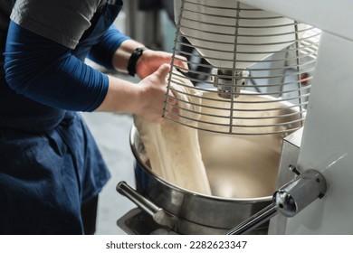 Dough kneading machine in a restaurant kitchen 