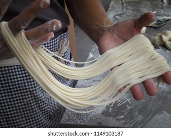 The dough is manually processed by hand to produce delicious pull noodles