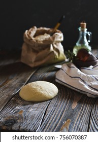 dough on a wooden table - Shutterstock ID 756070387