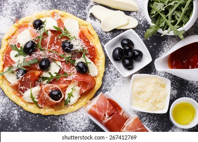 Dough pizza with ingredient.selective focus - Shutterstock ID 267412769