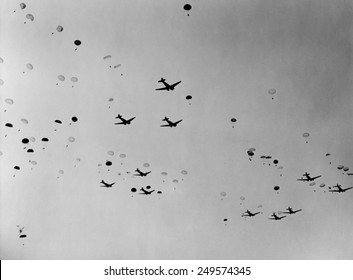 Douglas C-47s were the backbone of WW2 Airborne assault operations. Photo shows a parachute drop initiating Operation Dragoon, the Allied invasion of southern France. August 15, 1944.