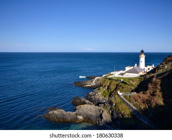 Douglas Lighthouse on the Isle of Man with sea on sunny day