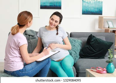 Doula With Pregnant Woman At Home