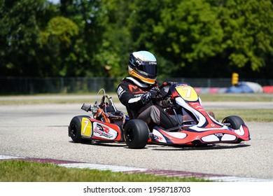 Dousman, Wisconsin USA - August 8th, 2019: Adult go-kart drivers raced in national races at Badger Kart club Wolf Paving Raceway. 