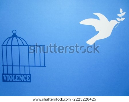 The dove as an icon of peace is free from the shackles of violence which is symbolized by the cage. International Day of Non-Violence illustration.