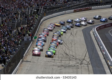 DOVER, DE - May 16:  The NASCAR Teams Takes The Green Flag At The Dover International Speedway For The Autism Speaks 400 Presented By Hershey's Milk & Milkshakes On May 16, 2010 In Dover, DE