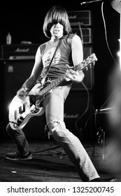 Dover, NJ/USA - January 9, 1978: Guitarist Johnny Ramone of legendary pink rock group The Ramones performs at a small venue in Dover, NJ