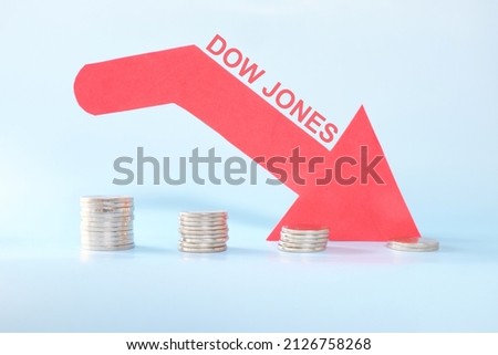 Dow Jones Industrial Average or DJIA index in red downward arrow with decreasing stack of coins. Bearish run in United States US stock market.	