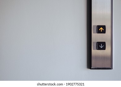 Up And Down Button In Front Of The Elevator For Direction, Up Red Light With Copy Space