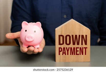 Down payment on home purchase. Man and piggy bank with house. Save for a down payment, leverage a piggy bank strategy, and achieve financial milestones for homeownership.