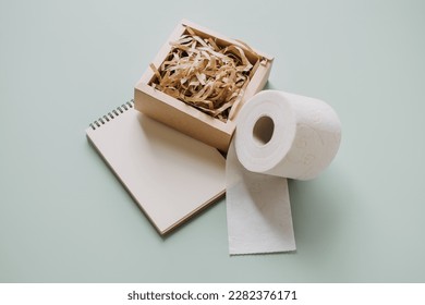 Downcycling recycling concept with different products of paper industry. Downcycling collecting and converting waste and materials into downcycled material of lower quality - Shutterstock ID 2282376171