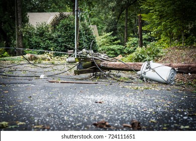 Downed Power Lines In Street After Storm.