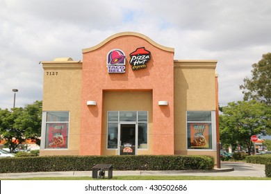 Downey, California, USA - May 8, 2016: Taco Bell and Pizza Hut are American chain of fast food restaurants and subsidiary of Yum! Brands, Inc., the world's largest fast food restaurant company.