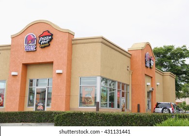 Downey, California, USA - May 9, 2016: Taco Bell And Pizza Hut Are American Chain Of Fast Food Restaurants And Subsidiary Of Yum! Brands, Inc., The World's Largest Fast Food Restaurant Company.