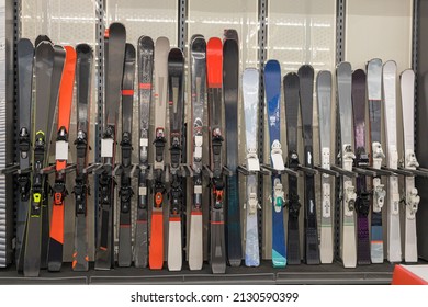 Downhill Skis On The Shelves Of A Sports Equipment Store