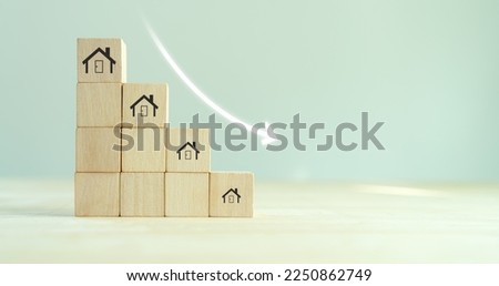 Downsizing home or crisis in the real estate market, housing market crash concept. Reducing demand for home buying. Downsizing property due to retirement or budget. Finding a tiny house or apartment.