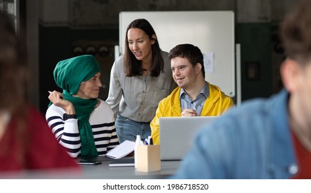 Down-syndrome Man Attending Education Class In Community Center, Inclusivity Of Disabled Person.