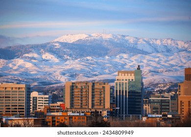 Downtown Boise, Idaho skyline and the snow covered foothills and Bogus Basin Ski Resort in March of 2024 - Powered by Shutterstock